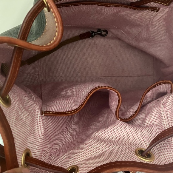 Dooney & Bourke Black and Brown Bucket Bag with Timeless Elegance - Picture 9 of 11